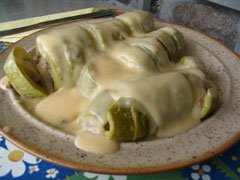 Stuffed Zucchini with egg and lemon sauce
